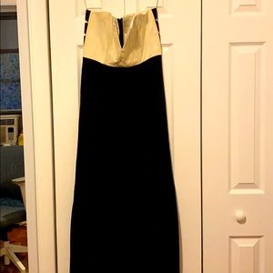 Strapless white leather top and black bottom dress